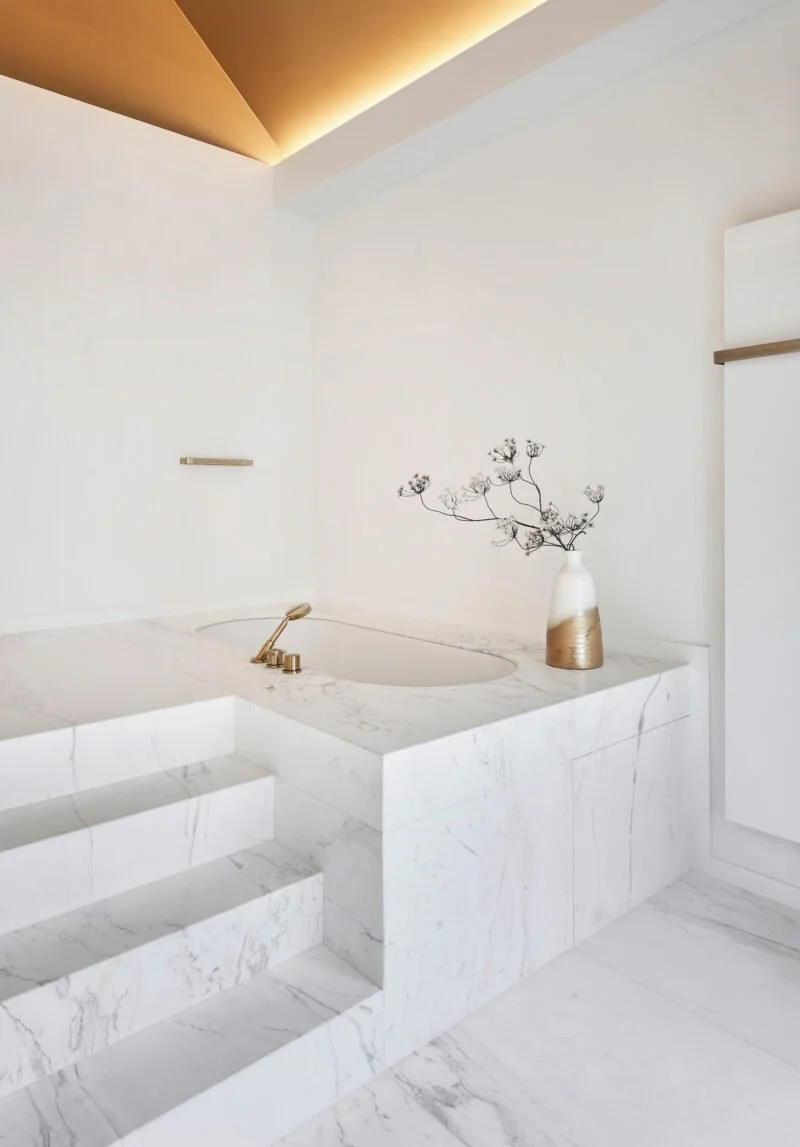 interior design bright bathroom marble white gold details